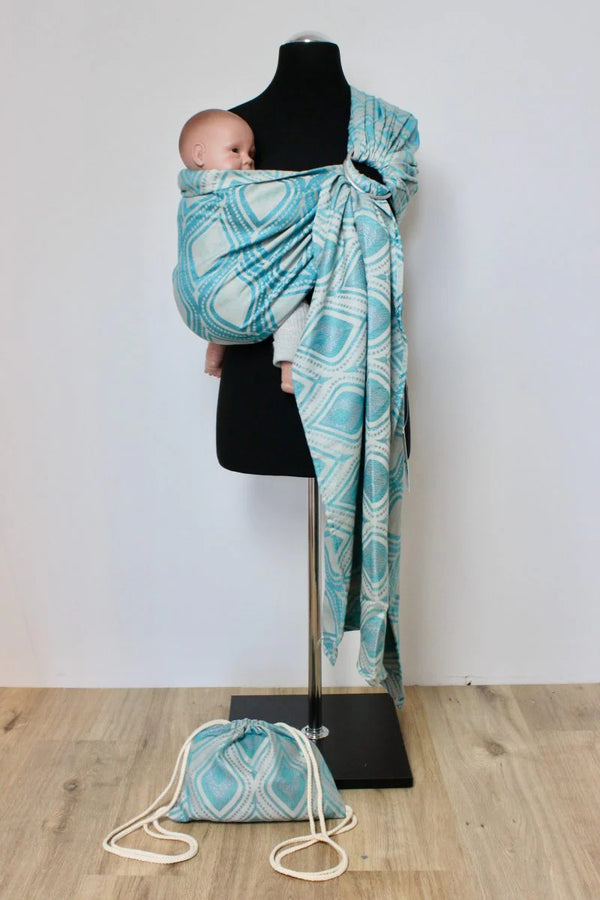 Ringsling Babytragetuch Sparkling Peacock von KAAMI